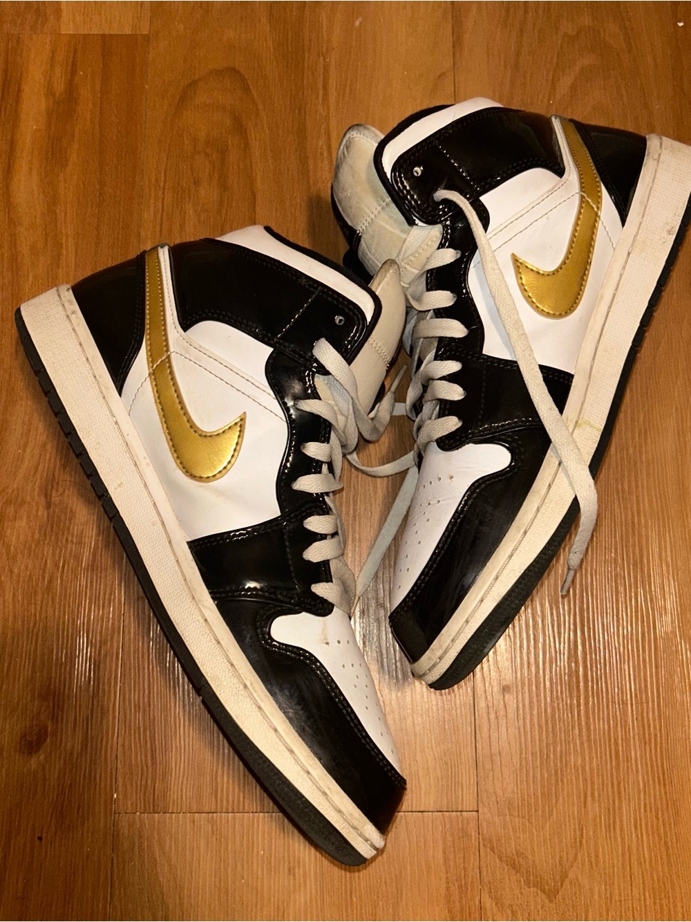 Nike Women’s High-Top Sneakers in Black, White & Gold
